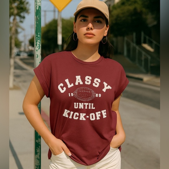 🎄 5/$25 Women’s Maroon Football Graphic Tee - Picture 1 of 6